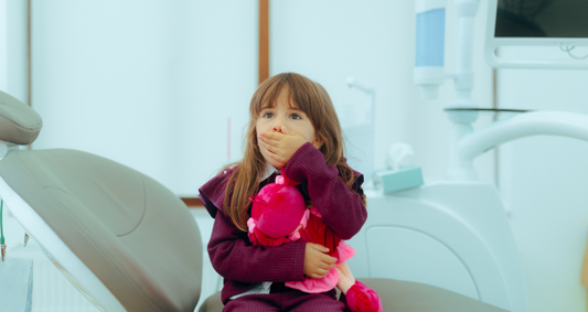 Girl with anxiety at the dentist office