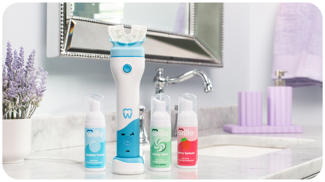 Willo kids automatic brushing toothbrush and 3 flavors of kids foaming toothpaste in a bright bathroom