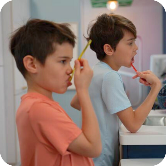 Two boys doing a bad job at brushing their teeth