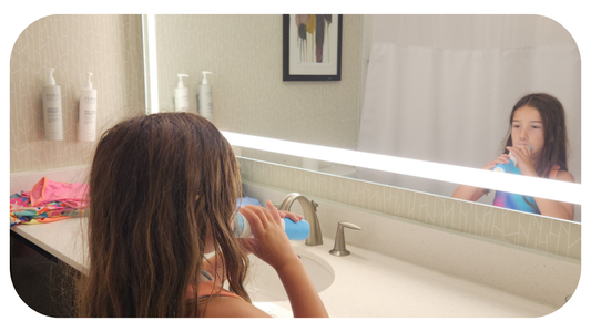 girl brushing her teeth with willo in hotel room
