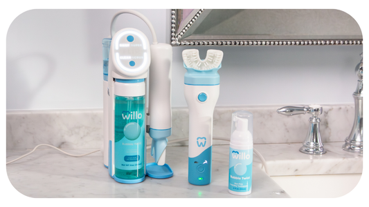 Willo kids automatic brushing toothbrushes AutoFlo+ and BrushBot in a bathroom