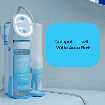 Willo AutoFlo+ water dispenser with a blue bottle on a tiled bathroom