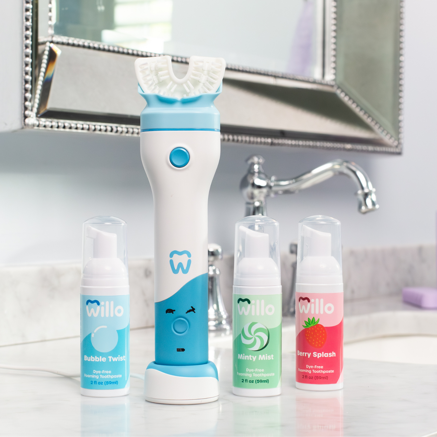 Willo dental care products including a toothbrush and mouthwash bottles on a bathroom counter.