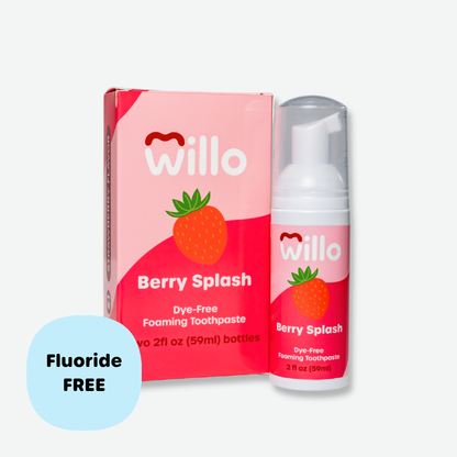 Willo Berry Splash dye-free foaming toothpaste pump bottle and matching product box. Features a pink design with a strawberry graphic and a light blue callout badge highlighting the 2 fl oz (59ml) fluoride-free formula.