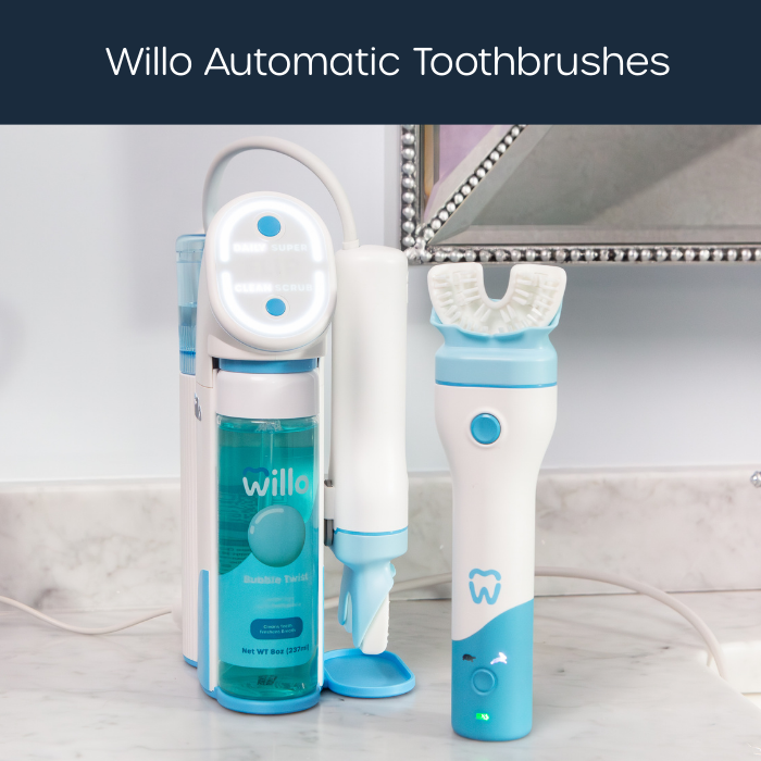 Willo Automatic Toothbrushes system display on a marble bathroom counter under a dark blue header banner. The image shows the smart base docking station loaded with a clear 8oz bottle of blue Bubble Twist liquid toothpaste alongside the white and blue mouthpiece toothbrush handle.