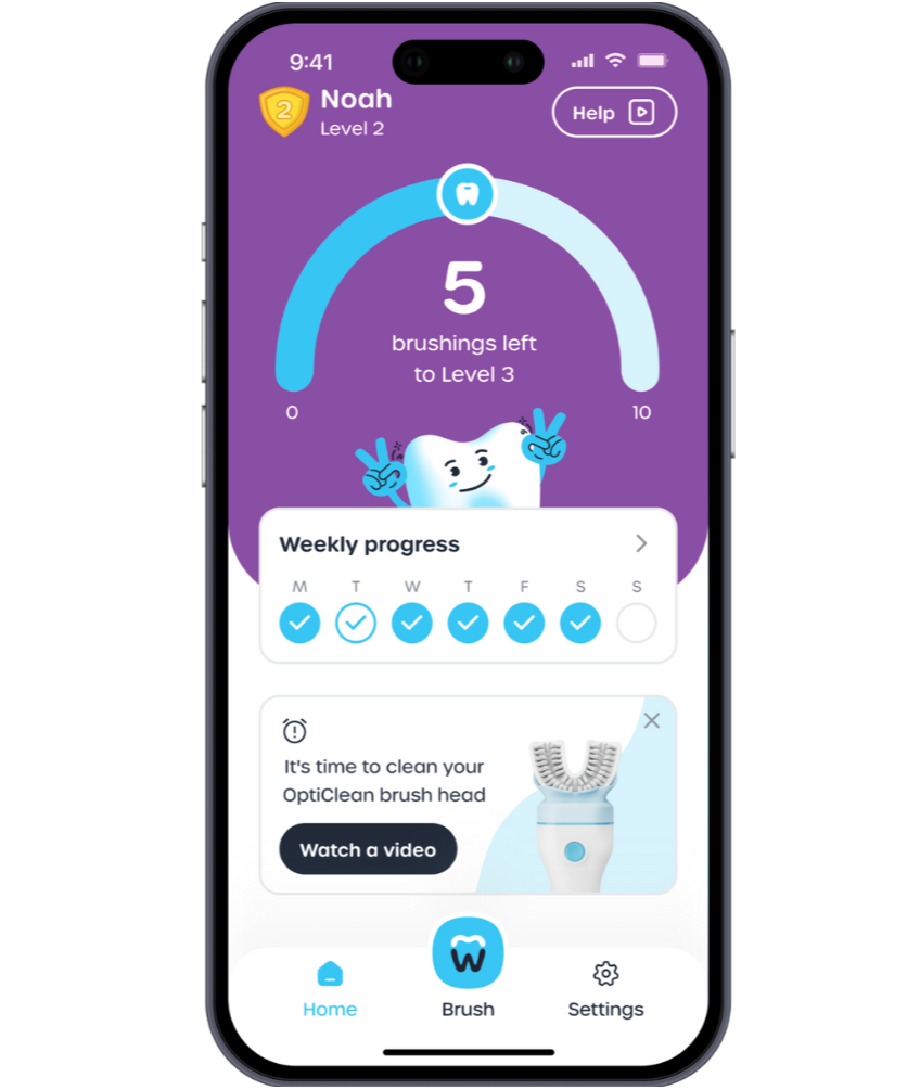 Phone displaying a dental care app interface with a purple background