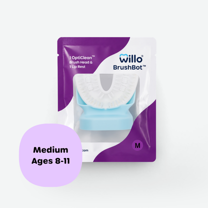 Willo BrushBot OptiClean toothbrush packaging in purple and white, showing a light blue and white toothbrush head. A lavender circle overlay reads 'Medium Ages 8-11'.