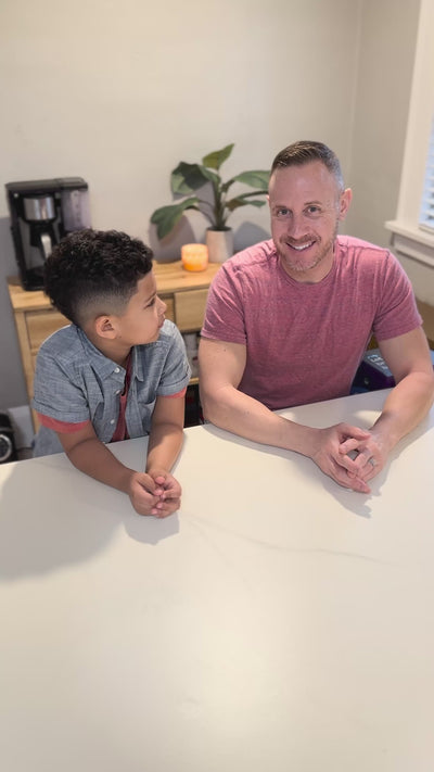 Dad and son unboxing and setting up Willo kids toothbrush