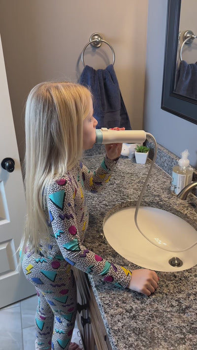 Mom and daughter using Willo kids toothbrush to make their lives easier