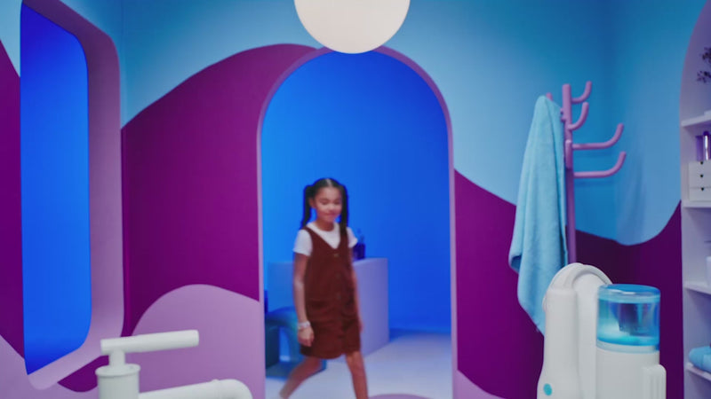 Timelapse of  different kids walking into a blue and purple bathroom and using Willo fully automated toothbrush including close ups of the toothbrush and companion app